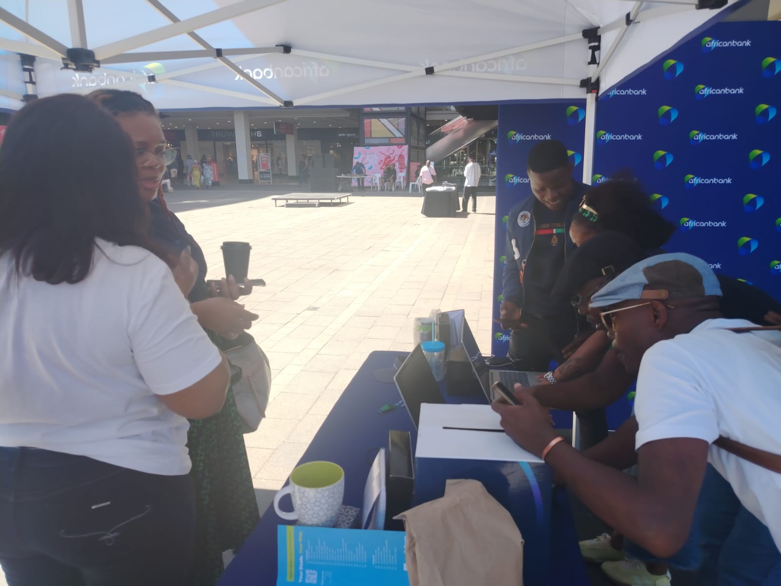 Young woman leading a community literacy programme for children in Alexandra, representing Lerato's leadership journey through Eminent Academy
